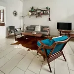 Lounge In The Intimate Urban Garden At A Retro Getaway